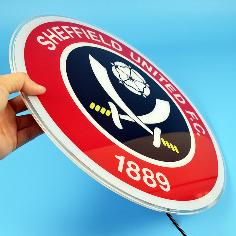 Sheffield United LED panel held in hand to show scale