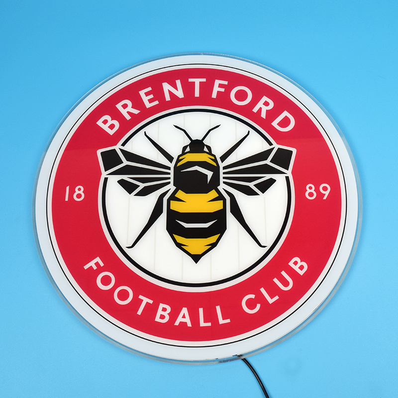 Brentford FC acrylic panel switched off, showing UV printed crest