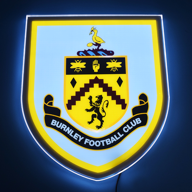 Burnley crest LED light-up panel glowing on a dark wall
