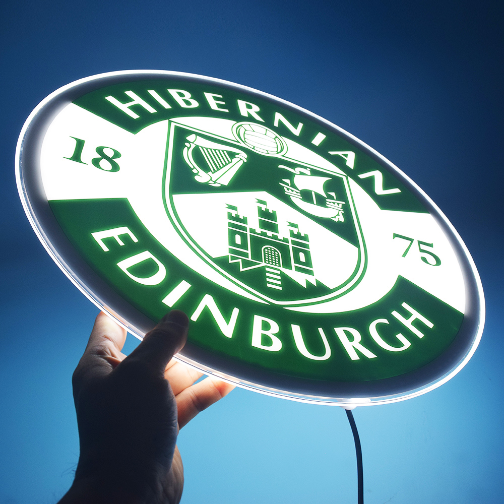 Hibernian LED panel held up while glowing
