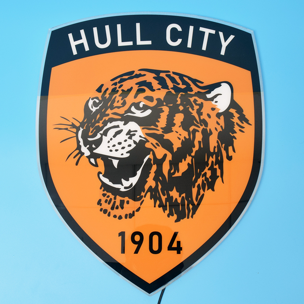 Hull City acrylic panel unlit on a blue wall