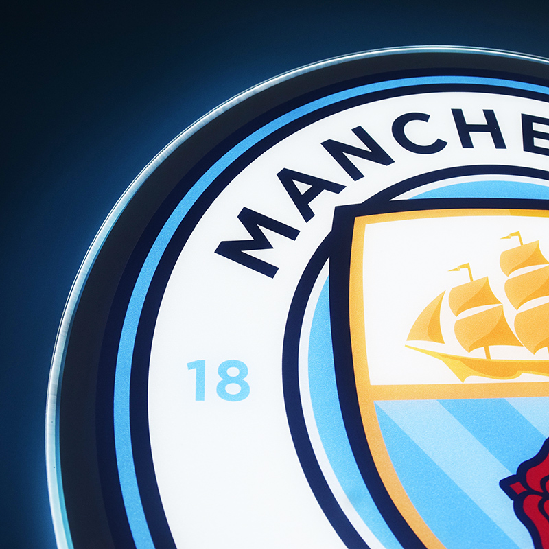 Close-up of the UV printed Manchester City crest detail