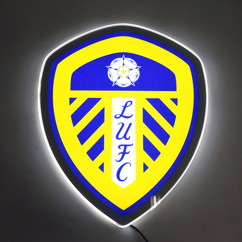 Leeds United crest LED light-up panel glowing on a dark wall