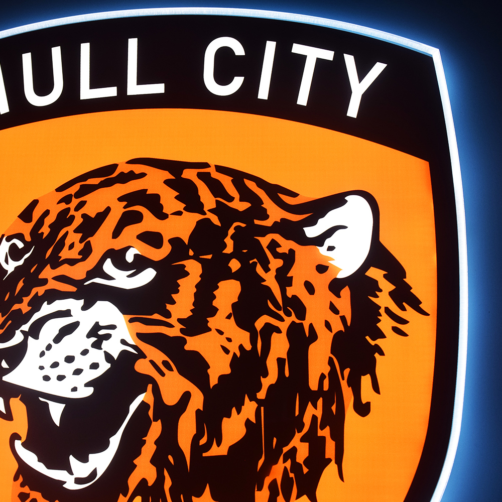 Close-up of the lit Hull City crest detail