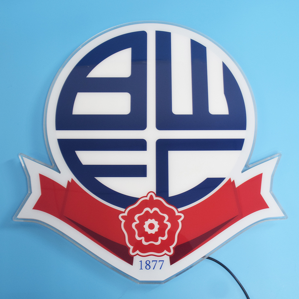 Bolton Wanderers acrylic panel unlit on a blue wall