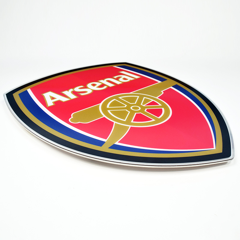 Angled view of the Arsenal acrylic crest panel unlit