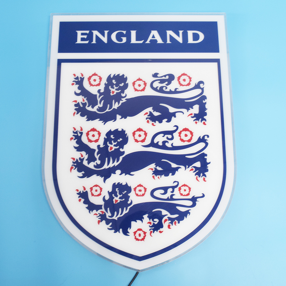 England acrylic panel unlit on a blue wall
